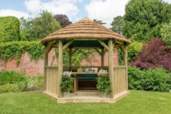 Forest Garden Hexagonal Thatched Roof Gazebo Furnished Green